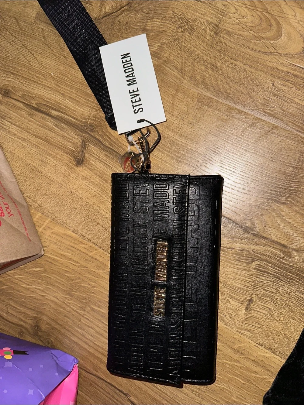 Steve Madden embossed logo print wristlet wallet